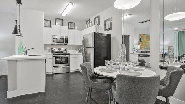 Evolve Apartments - Dining Room with Grey and White Furnishing, Kitchen, and Living Room
